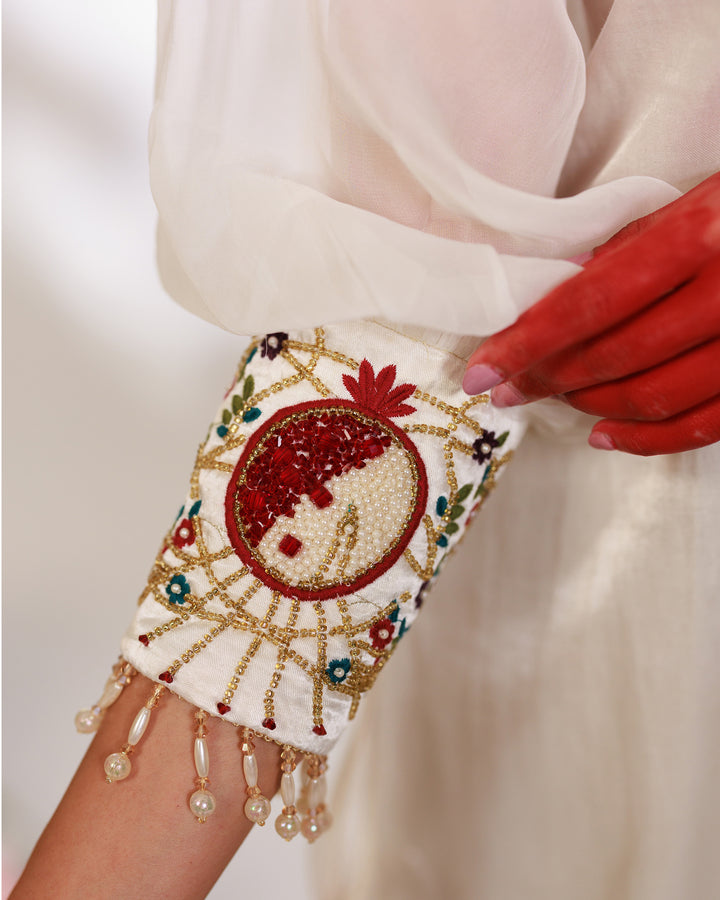 Embroidered by hand